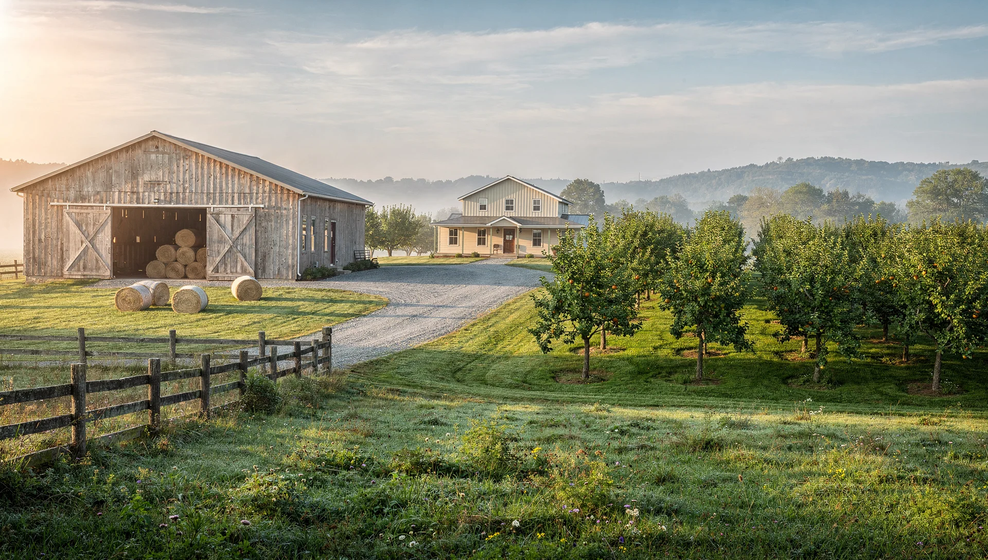 Rural farm courtyard with guests arriving near a traditional guesthouse and garden